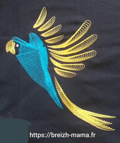 Motif broderie perroquet bleu
